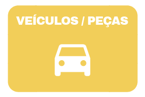 Imagem de um carro na cor branca. Acima, o texto "veículos / peças".